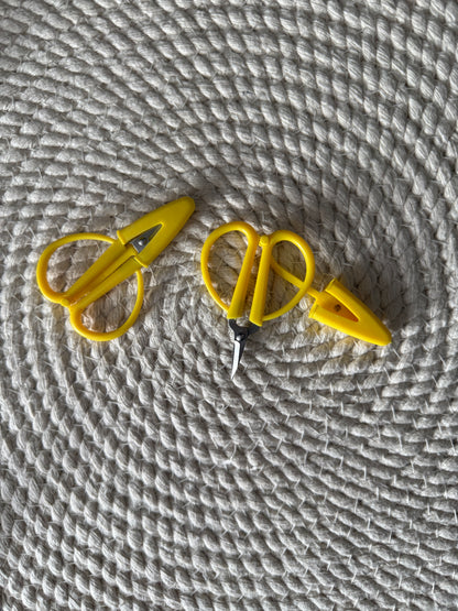 Tiny scissors with silicone cover